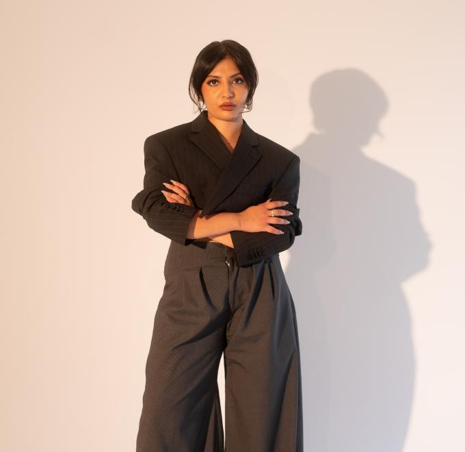Gauri B